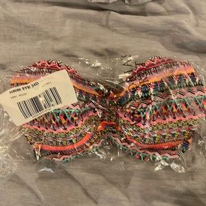 Multi color swim top, underwire, new with tags.